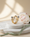 Anillo Triple con Esferas Plateadas