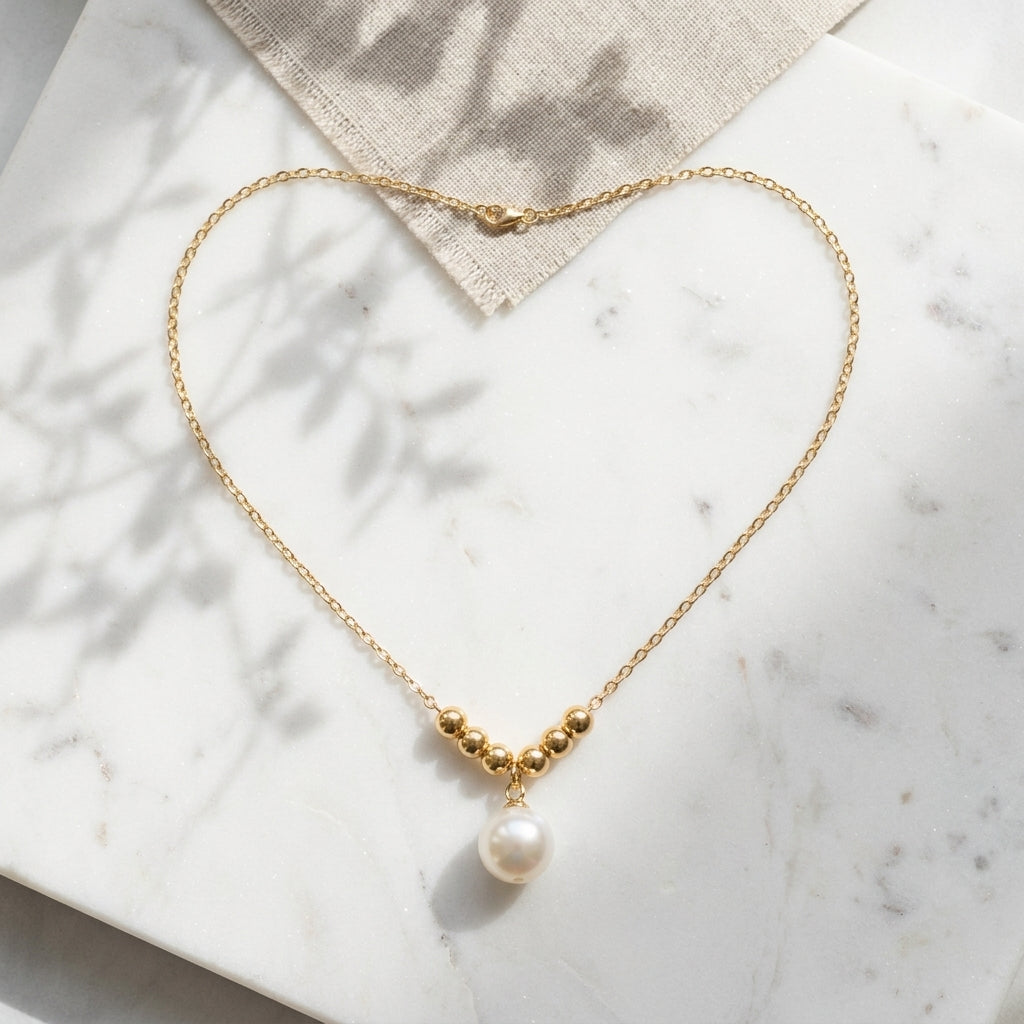 Collar Bolitas Doradas con Perla
