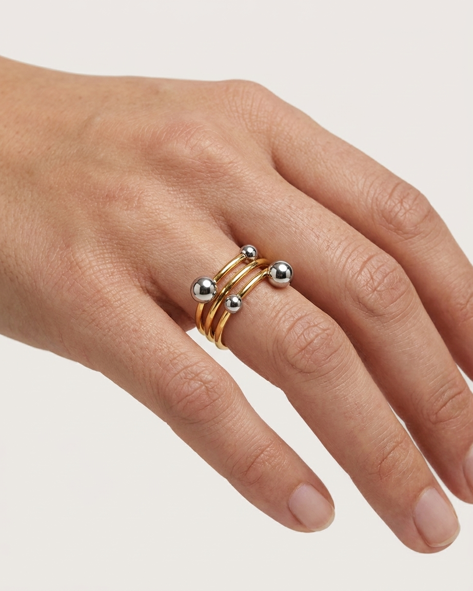 Anillo Espiral Bicolor con Esferas