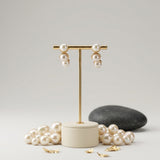 Aretes Colgantes de Tres Perlas