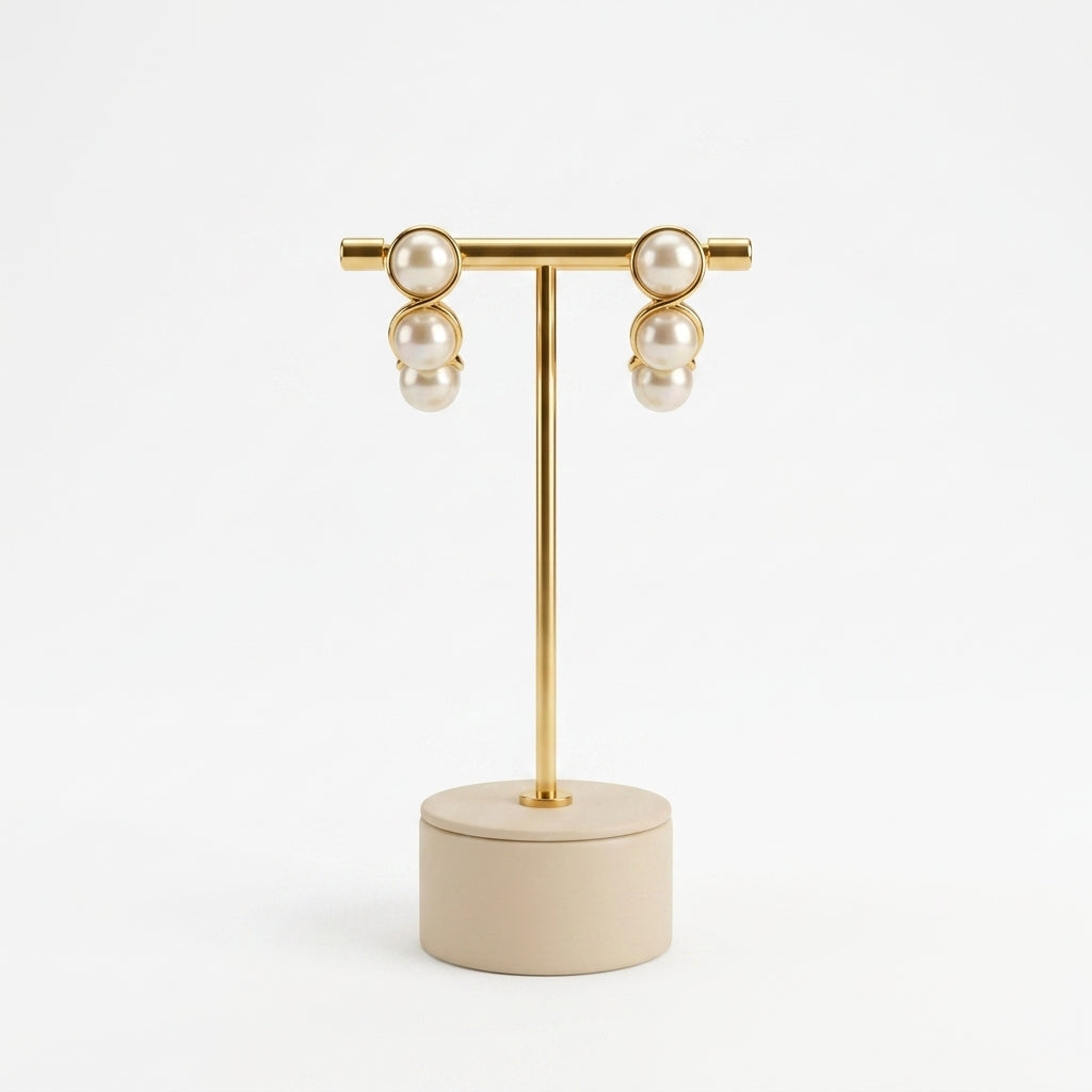 Aretes Colgantes de Tres Perlas